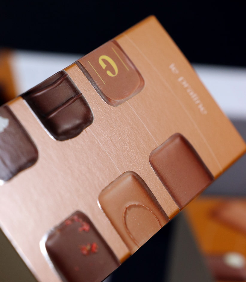 Copertine in cartoncino per cofanetti di praline Giotto, con effetti 3D e verniciatura opaca che valorizzano il prodotto.